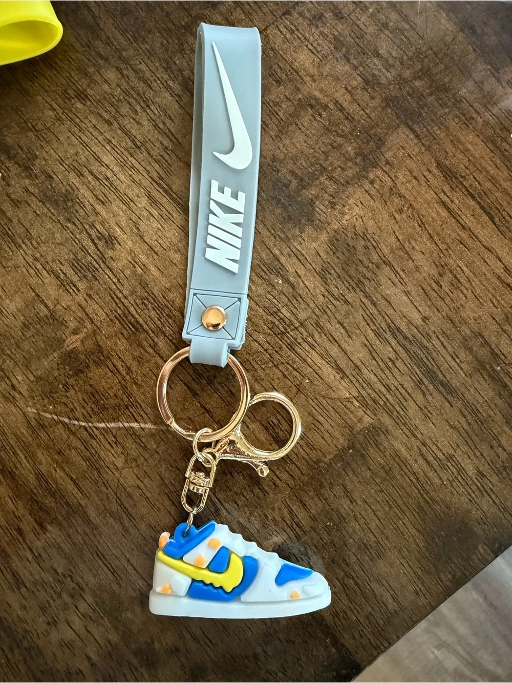 Nike Light gray Silicone Strap Keyring with Colorful Mini Sneaker Charm